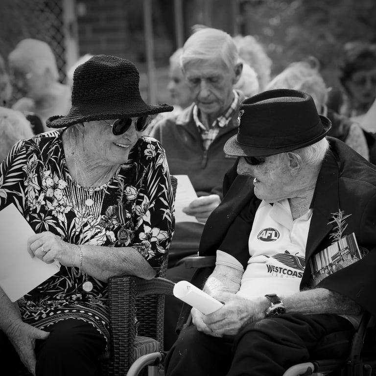 Photographer, Peter Pickering, captures a poignant moment an old couple share a story