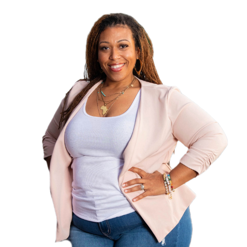 Smiling woman entrepreneur in a pink blazer and white top, posing for a professional headshot.