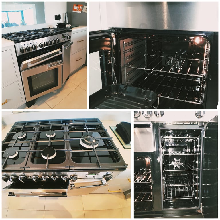 A freshly cleaned beautiful Rangemaster range cooker in stainless steel