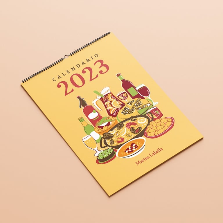 a 2023 calendar cover with food plates of Spanish gastronomy