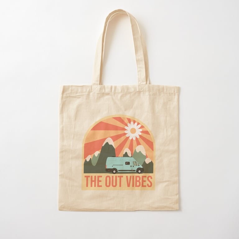 a tote bag with a van and mountains in the background
