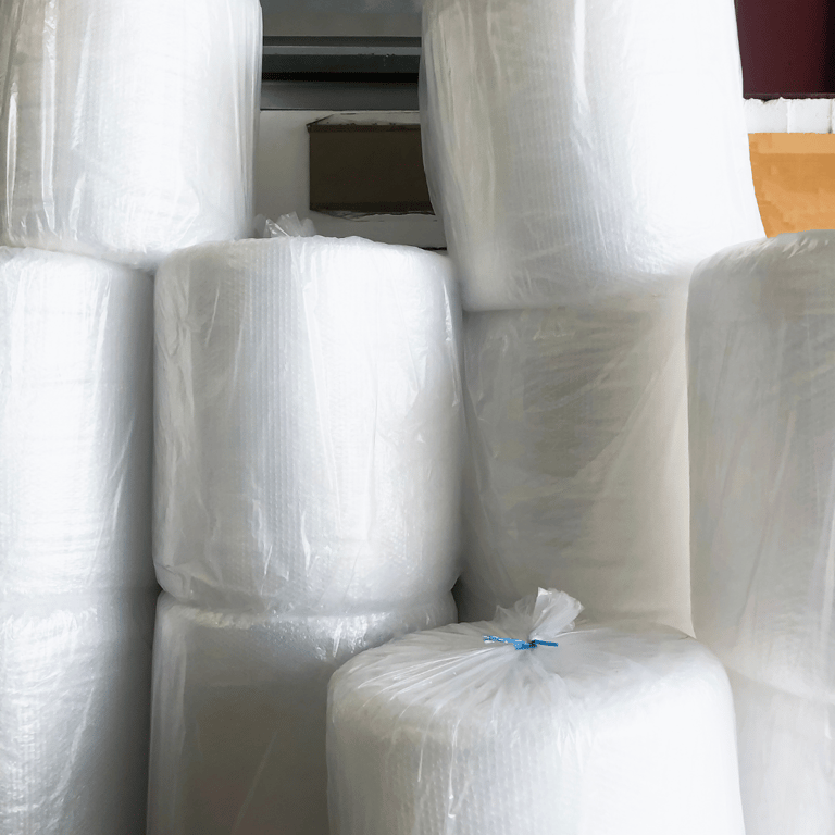 a bunch of rolls of plastic wrappers bubble wrap rolls