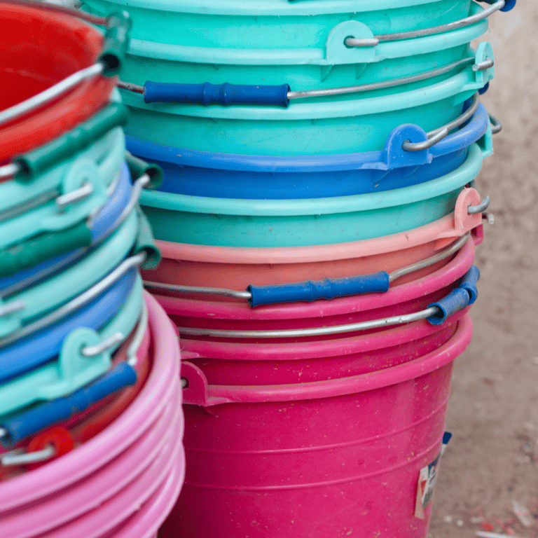 a bunch of buckets with different colored plastic buckets