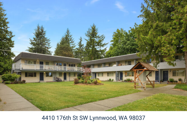A tan colored 2-story multi-family apartment complex