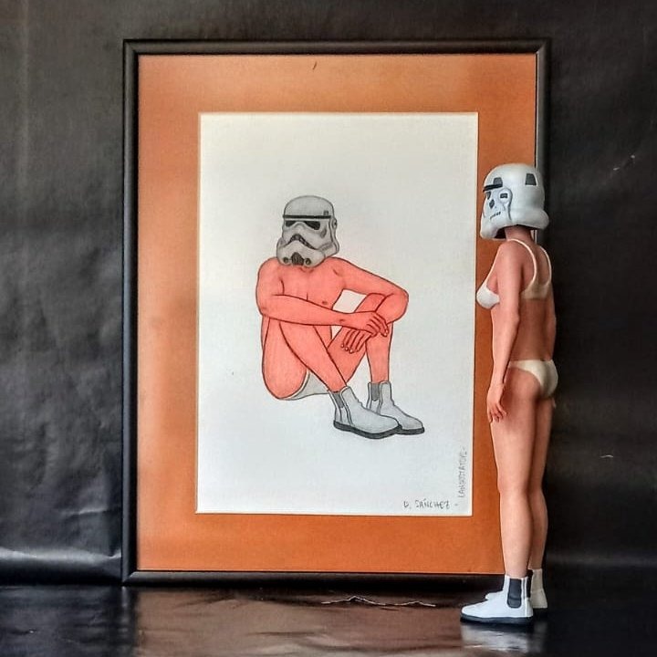 Creative Star Wars art featuring a framed Stormtrooper sketch and a matching female figure model.