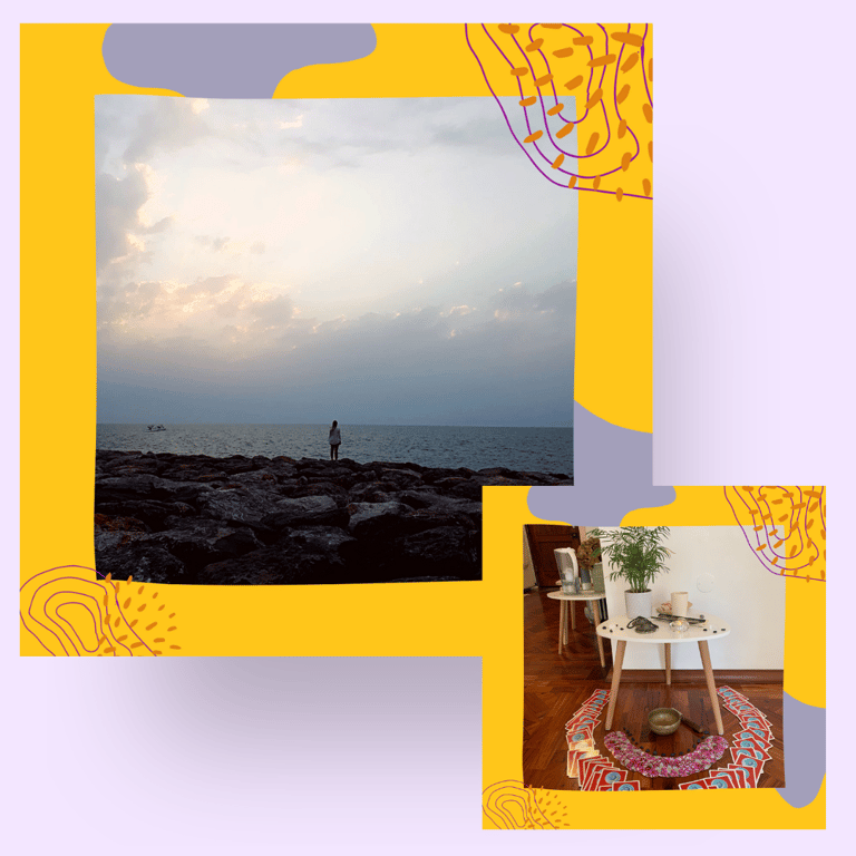 Martina standing on rocks looking out to the sea.