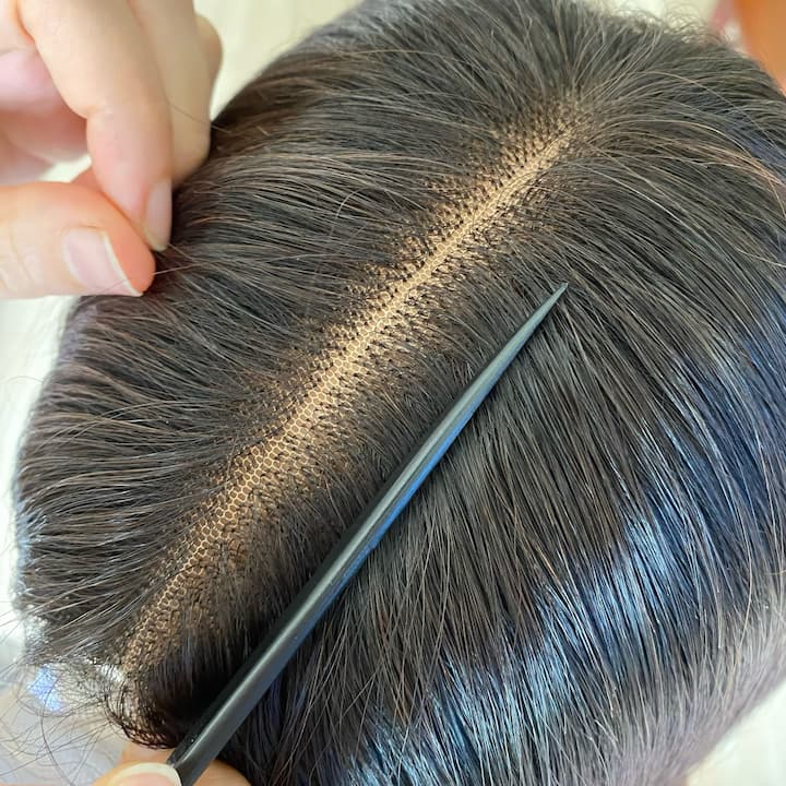 Close-up of HD Swiss lace and precise stitching inside VietSilkHair premium wig