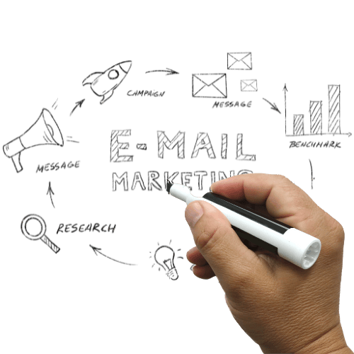 a person's hand holding a pen and drawing a house