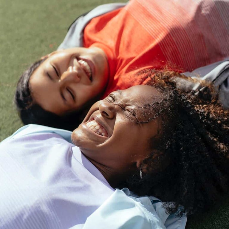 Beautiful teenagers lying in the sun