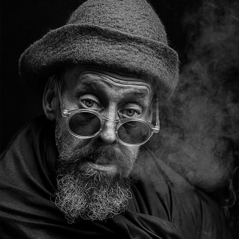 Street character portrait of man by Carol Visser
