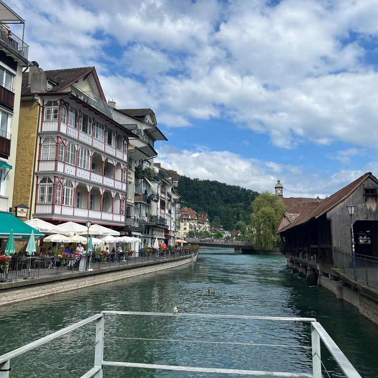Looking down a side channel of the Aare River in Thun Switzerland