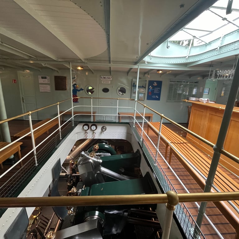 Open engine compartment on Steamship Blümlisalp on Lake Thun Switzerland