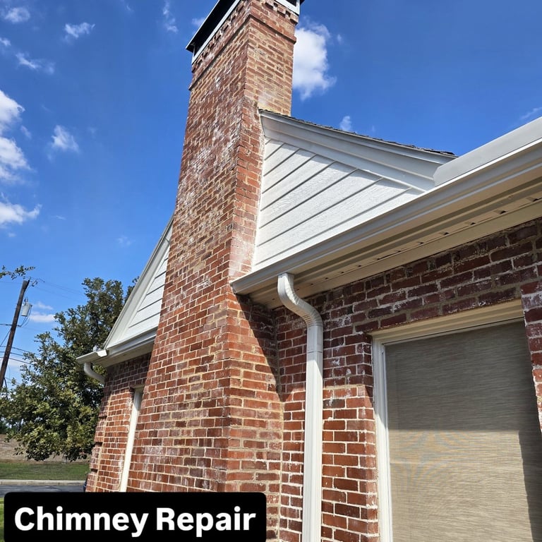 A refurbished chimney area with watertight seal and chimney cap