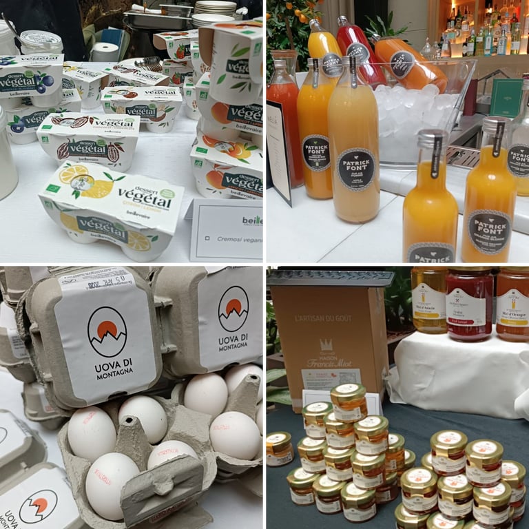 Selezione di prodotti premium per la colazione tra latticini, succhi, uova e confetture