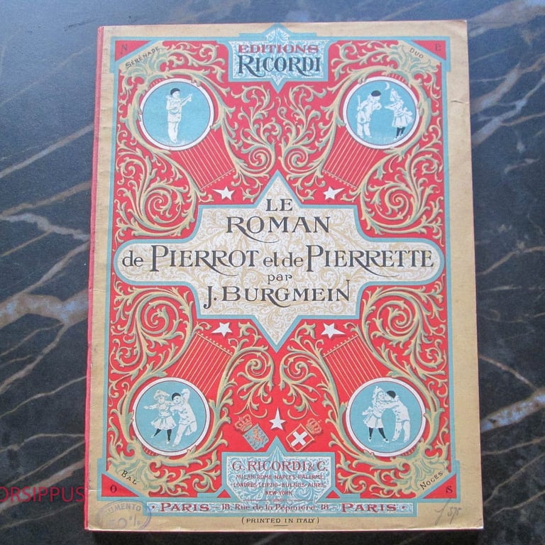 an antique Franch book with a partitures of Pierrot ans Pierettepicture of a woman in a red dress