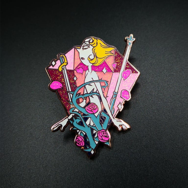 a glittered hard enamel pin