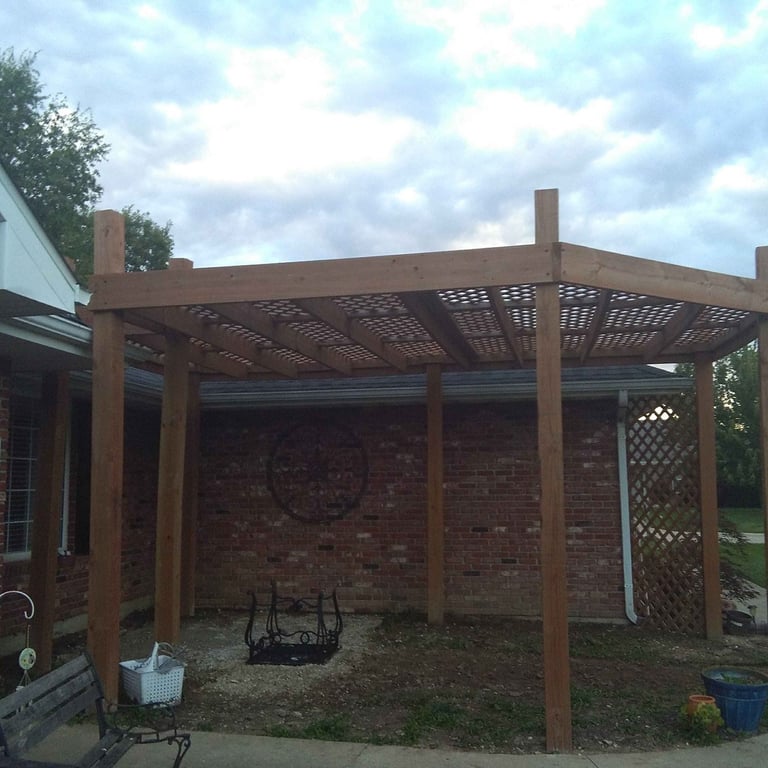 a pergolized wooden pergolized patio with a pergolized roof