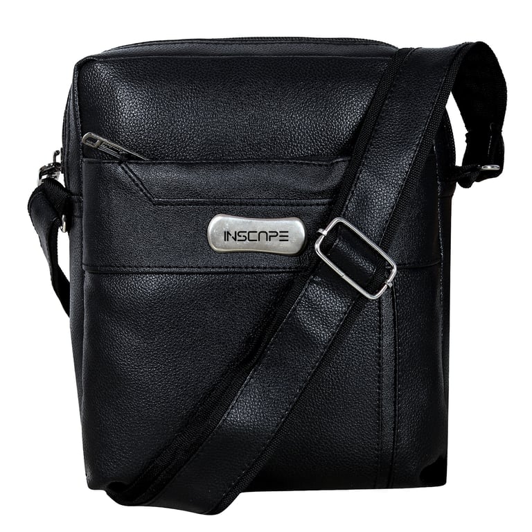 a black leather sling bag with a metal buckle