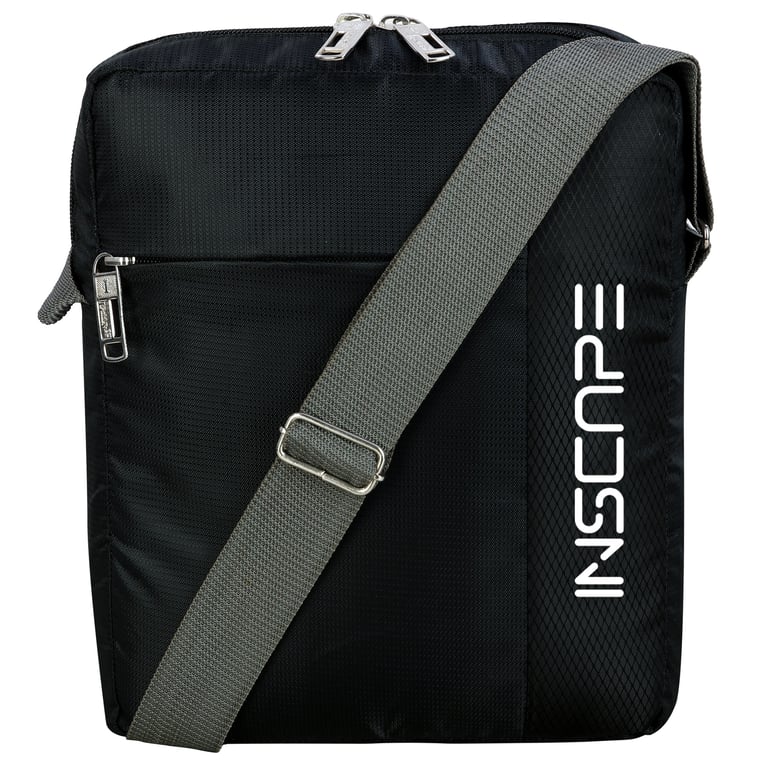 a black and white sling bag with a grey strap