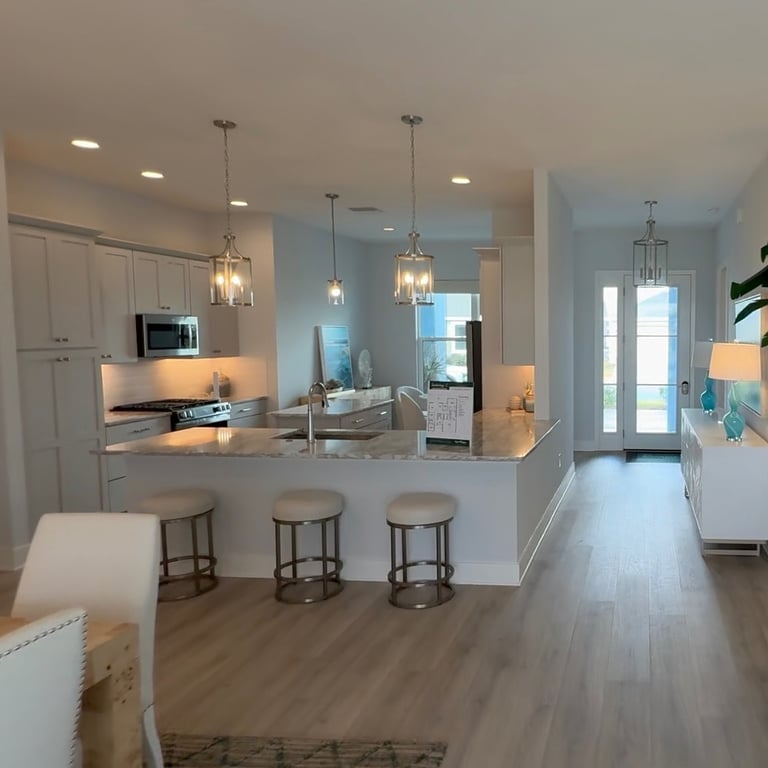 Interior of a Sanderling model home on the Street of Dreams with view of kitchen and entry way