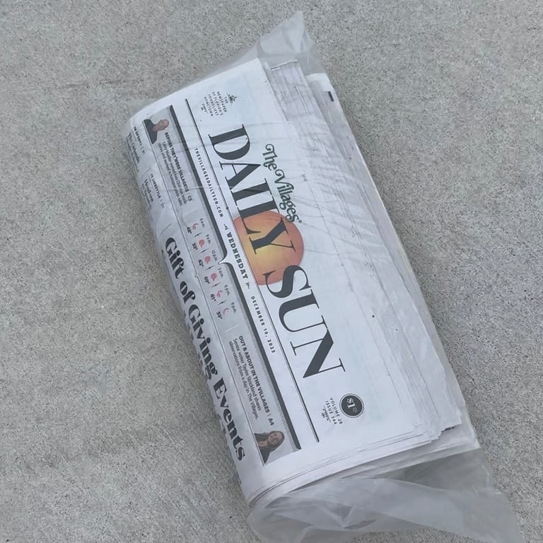 The Villages The Sun newspaper delivered daily to the driveway during our stay