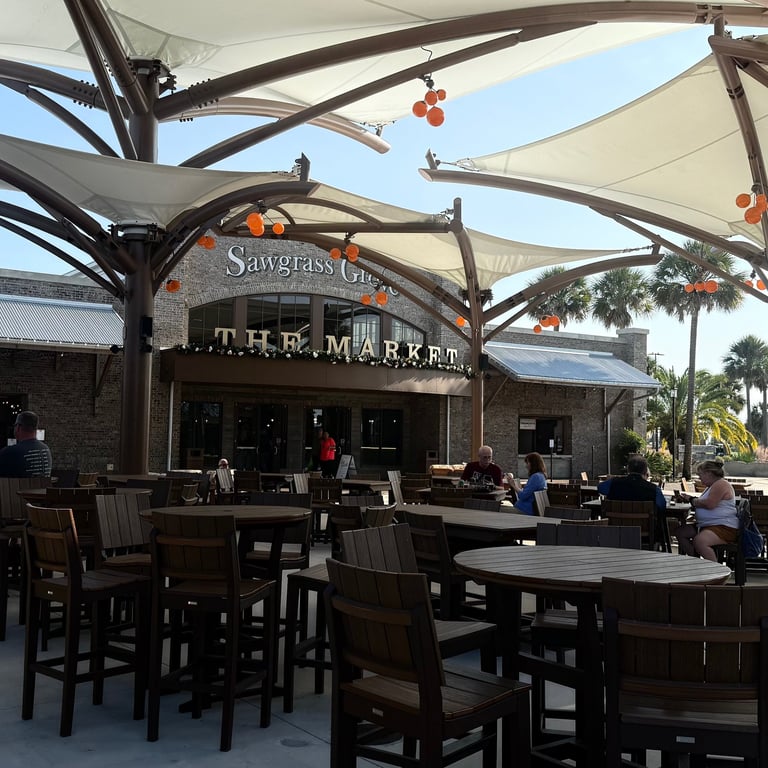 Outdoor seating at The Market at Sawgrass Grove food hall near our villa