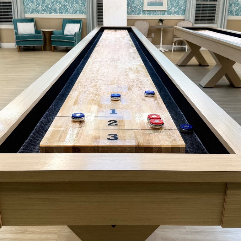 Indoor table shuffleboard game at St. Tropez recreation center in The Villages on a rainy night