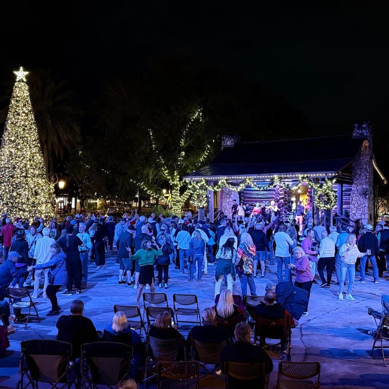 Evening crowd gathered for live music and dancing at a Brownwood Paddock Square in The Villages