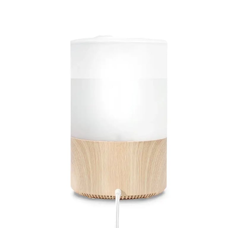 Rear view of Levoit humidifier with wood-textured base and visible power cable