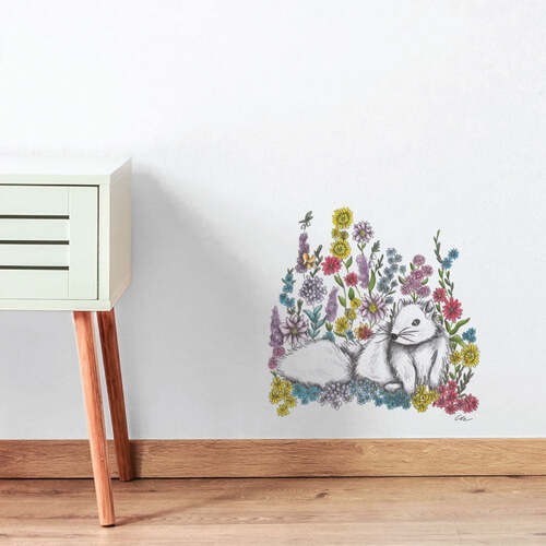 White wall with a hand-drawn squirrel illustration wall sticker