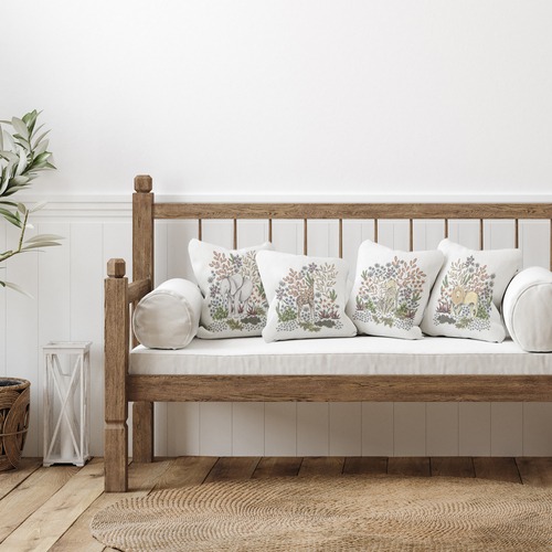 Living Room with Pillows featuring Animals Illustration on a Couch