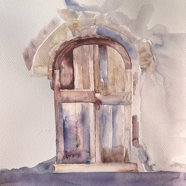 Violet arched doorway set within mineral textured façade