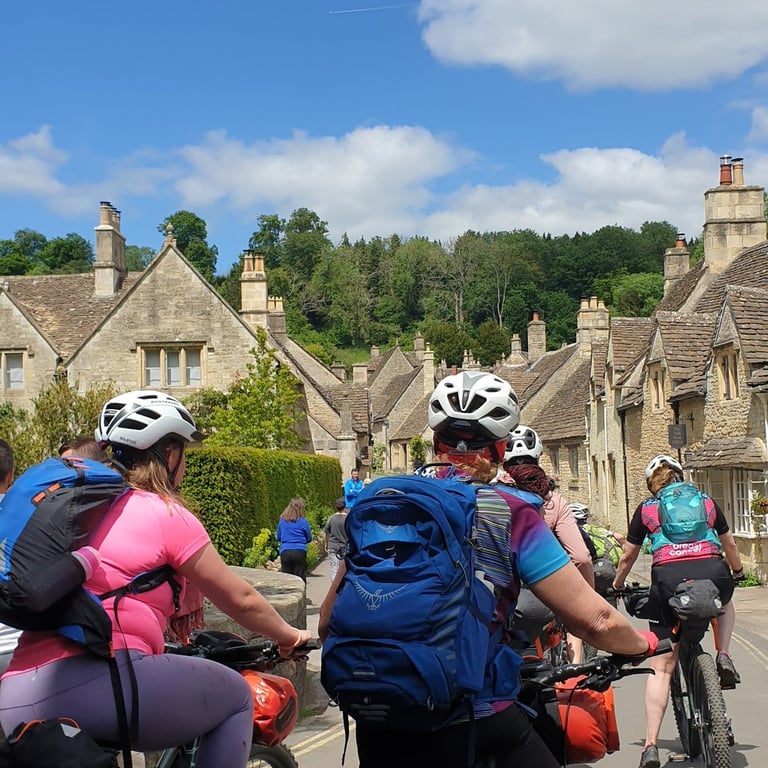 A group of women riding bikes on a guided mtb bike packing trip