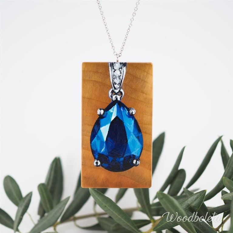 hand painted blue sapphire on cherry wood pendant 
