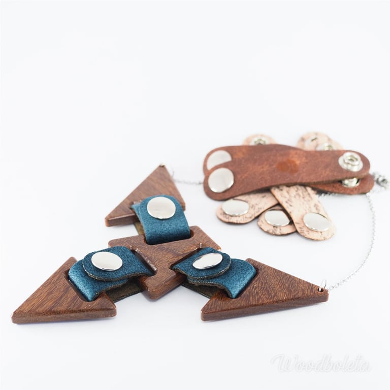 Necklace with wooden pendants connected with fabric straps