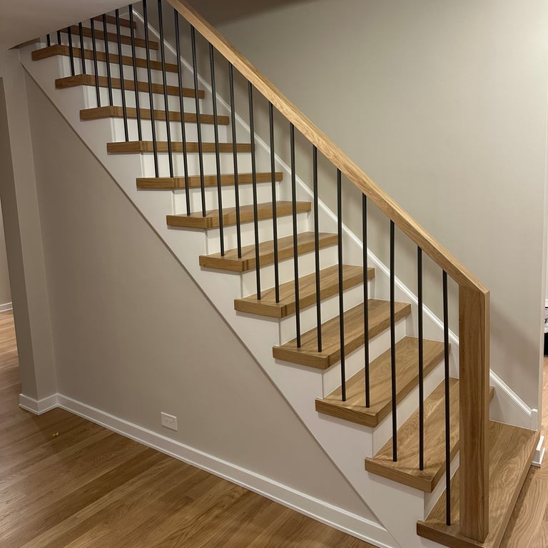 White oak stair treads with white painted risers matching new hardwood floors