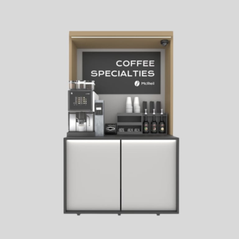 Pašapkalpošanās kafijas stacija McReil birojā ar iebūvētu kafijas automātu un uzkodu plauktiem.