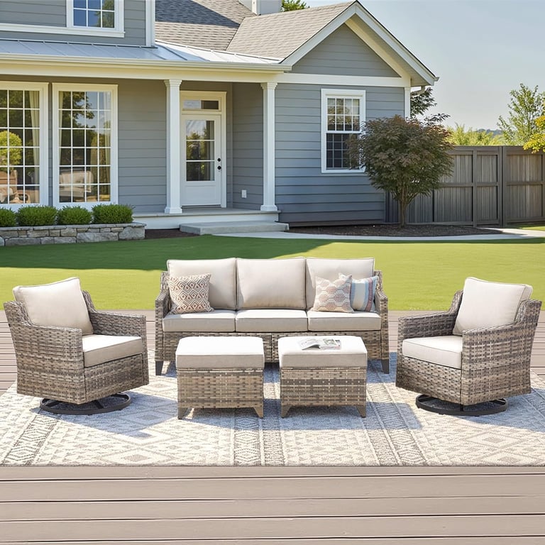 Modern 6-piece wicker patio furniture set with swivel chairs, sofa, and ottomans on a backyard deck.