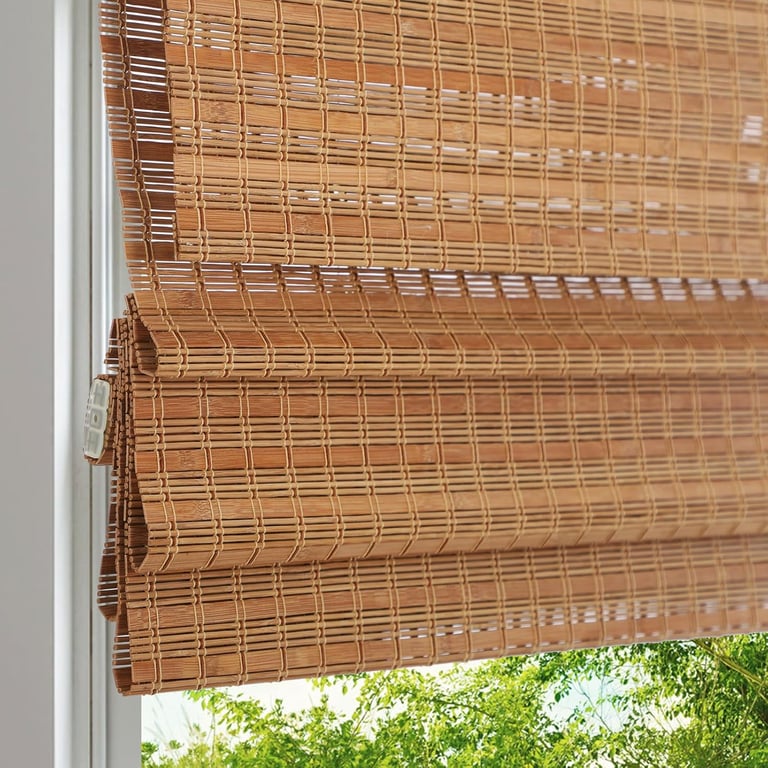 Woven natural bamboo roman shades for window privacy and light filtering in a modern home interior.