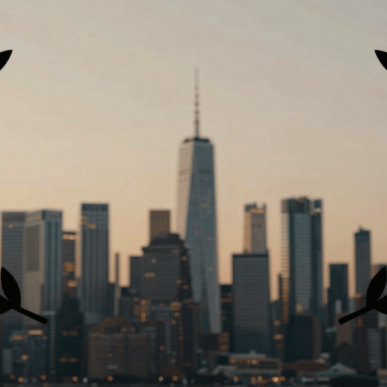Minimalist shot of an Ontario courthouse's stone facade in soft off-white, emphasizing geometry and authority.