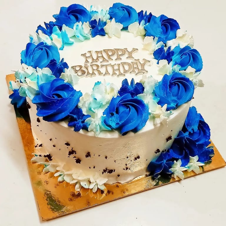 Delicious chocolate truffle cake topped with rich chocolate ganache, garnished with chocolate shavin