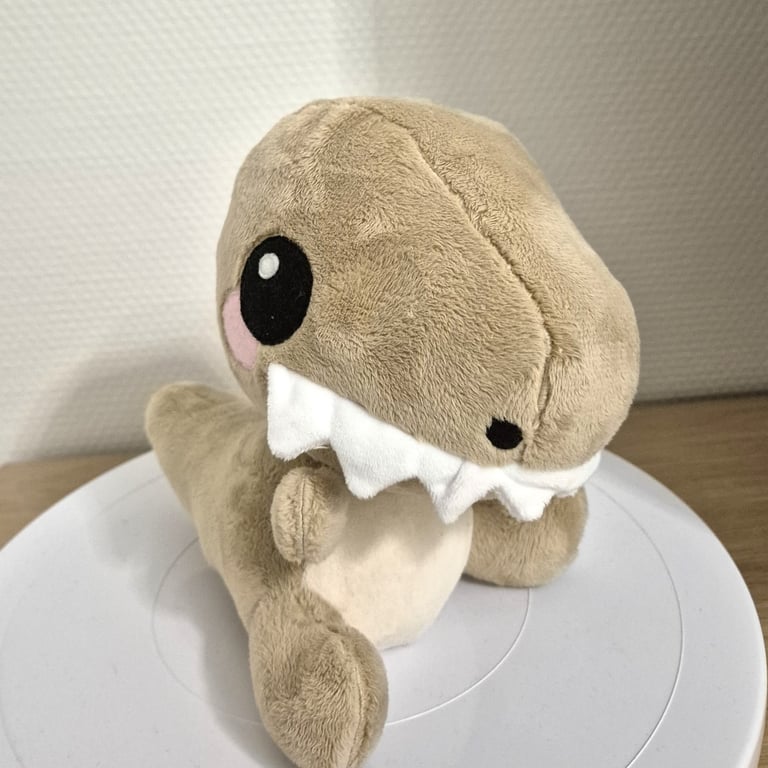 Une peluche de T-Rex / A stuffed plush T-Rex