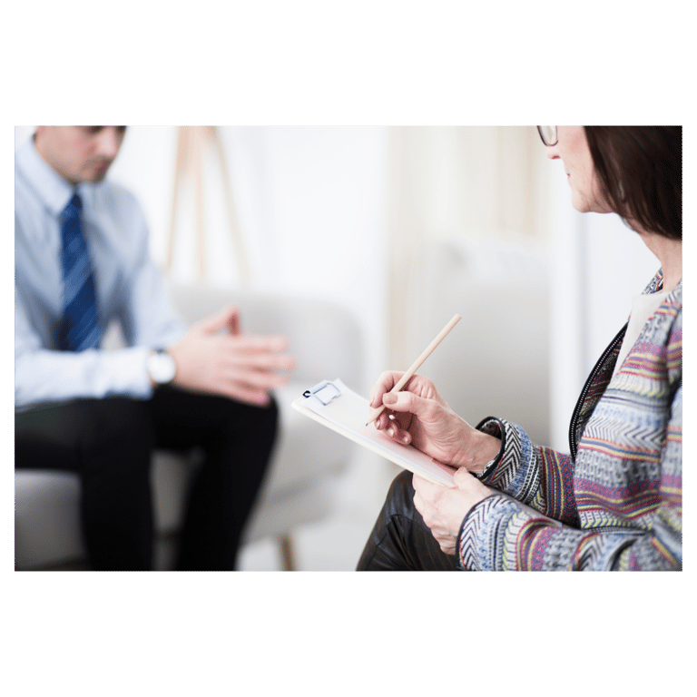 a woman in a ther suit is sitting in a chair