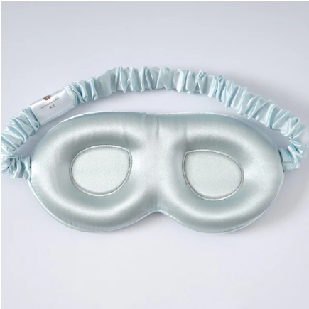 Contoured mulberry silk sleep mask designed to block light without eye pressure