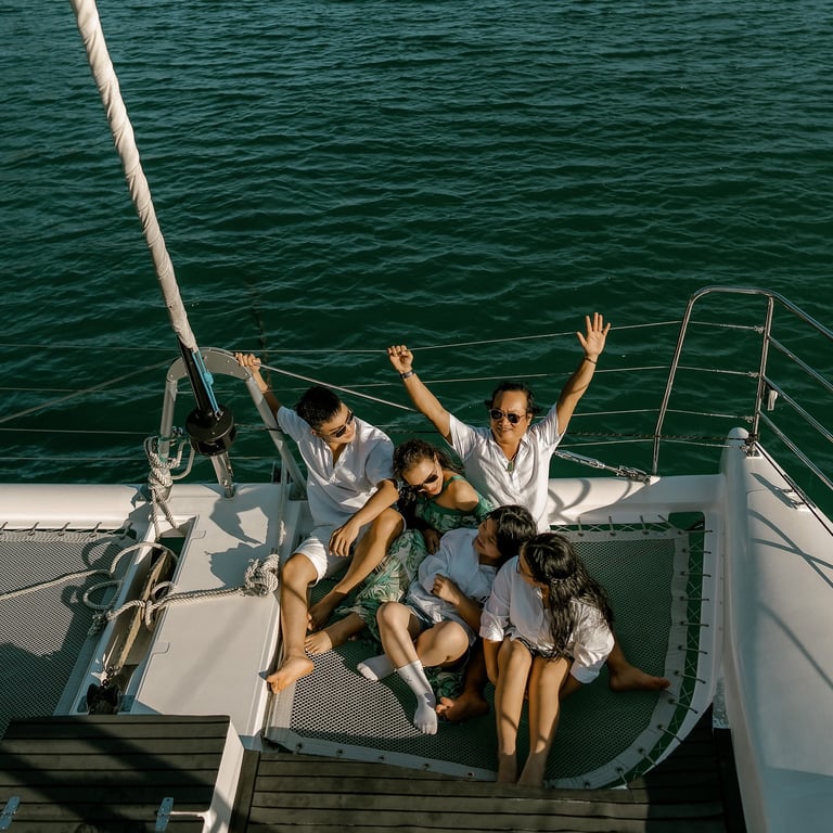 a group of people sitting on a boat
