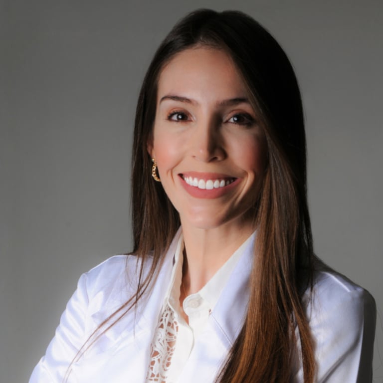 a woman with long hair and a white shirt