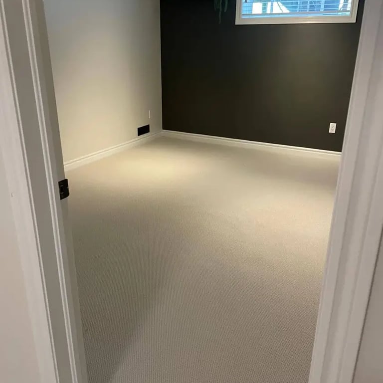 Ace low pile berber carpet installed wall-to-wall in basement bedroom of London Ontario residential home, durable and afforda