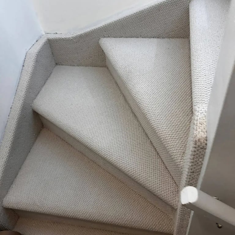 Grey Ace low pile berber carpet installed wall-to-wall on residential stairs in London Ontario home