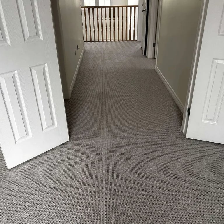 Naples Berber carpet installed in hallway with view into bedroom – textured loop pattern, ideal for busy homes in London!