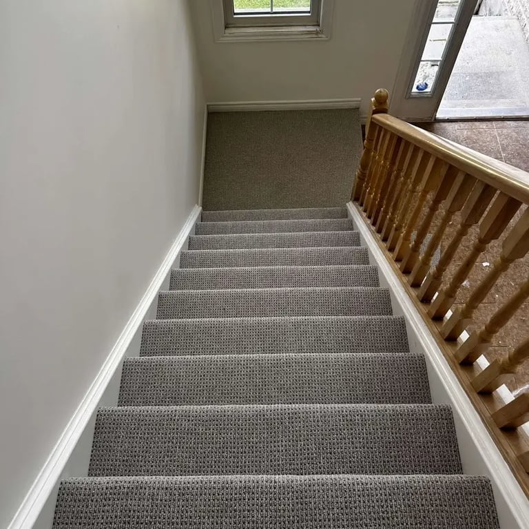 Naples Berber carpet installation on staircase – textured, durable finish in a classic neutral tone, perfect for busy homes